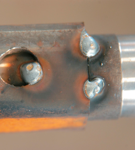 Stub axle tack - welded in place