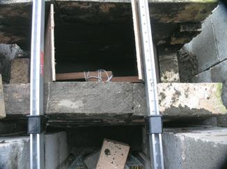 Looking down into smoke chamber. Tied wood pieces break apart for pulling the ply spacer out after the concrete has set.