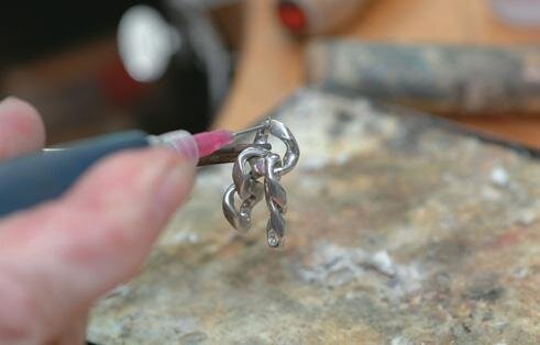 Applying silver solder to chain