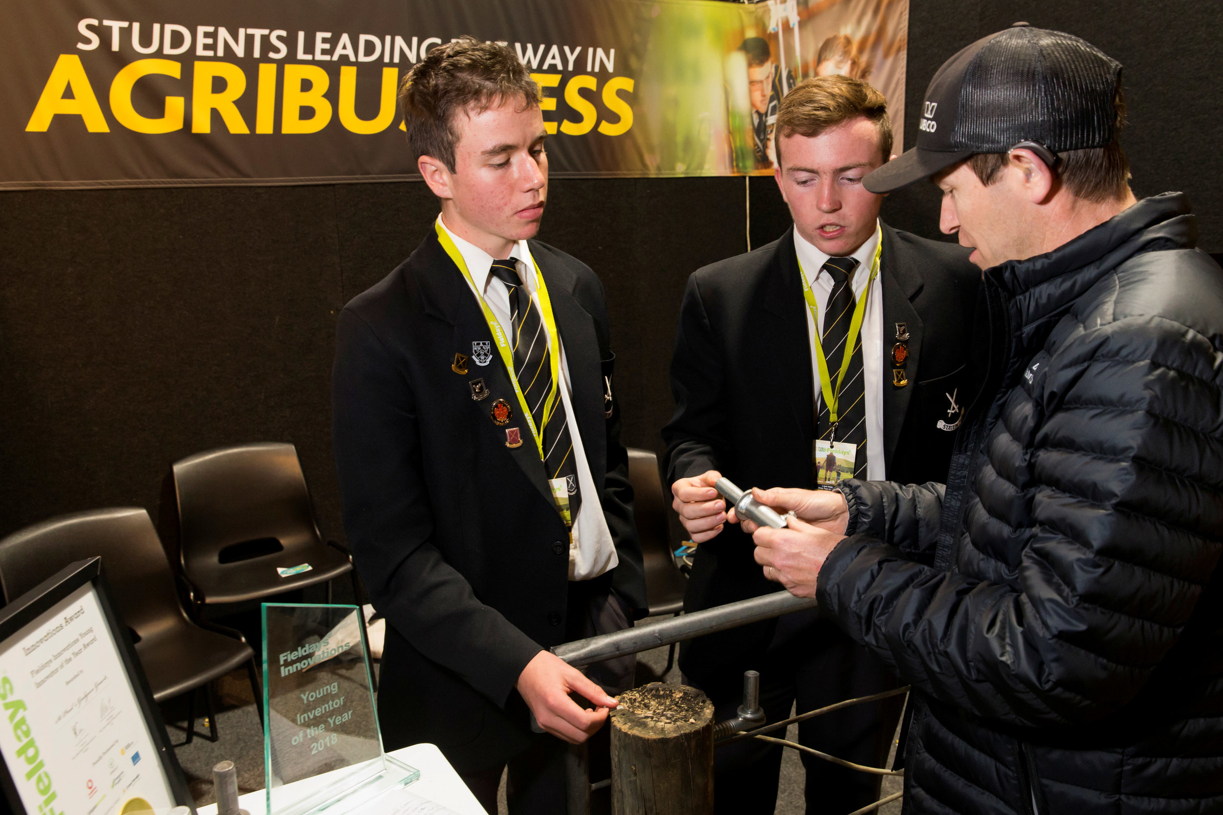 Students from St Paul’s Collegiate talking with Fieldays visitors on their invention – the Gudgeon Guard
