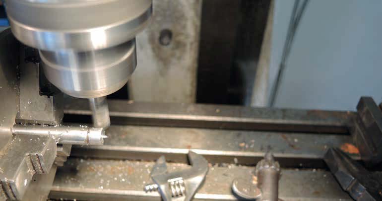 The hexagon being milled in the dividing head on the mill
