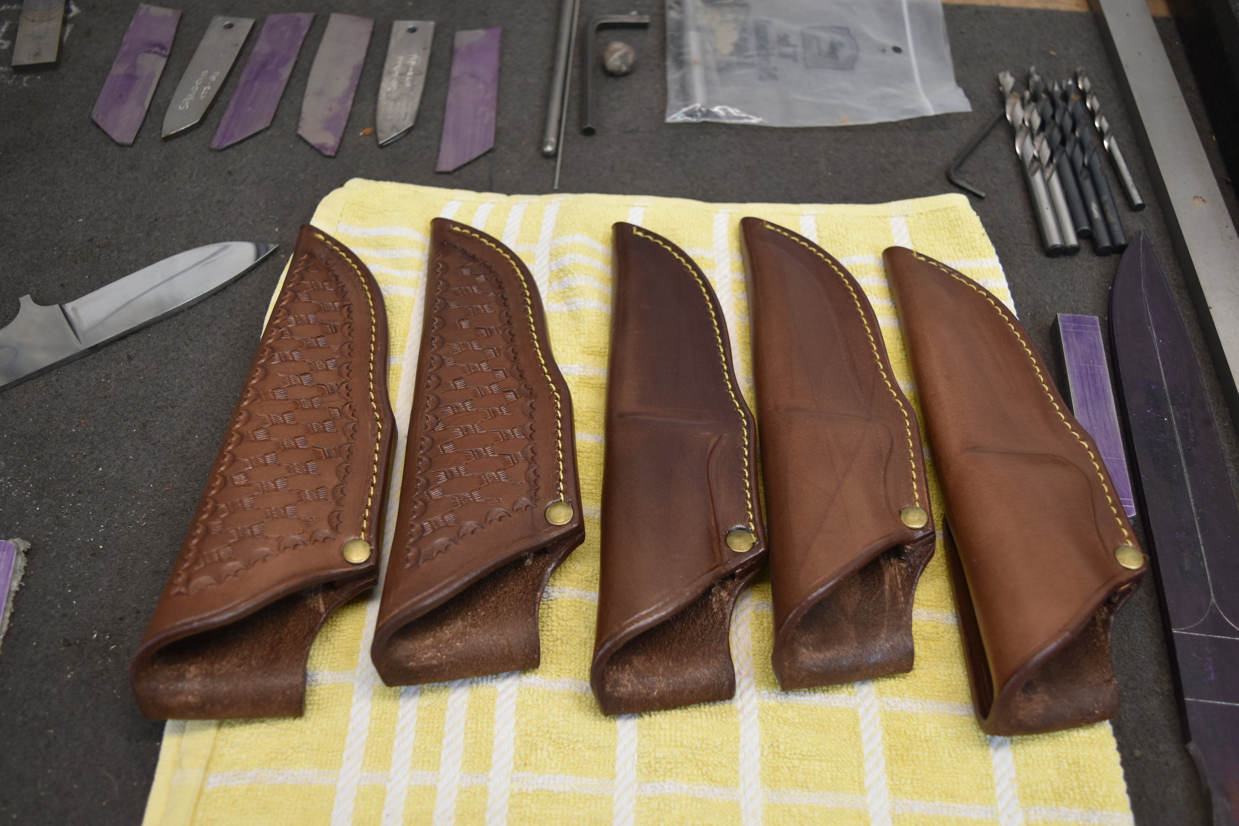 Some of the Auckland-made custom-designed sheaths Brent can provide with his knives