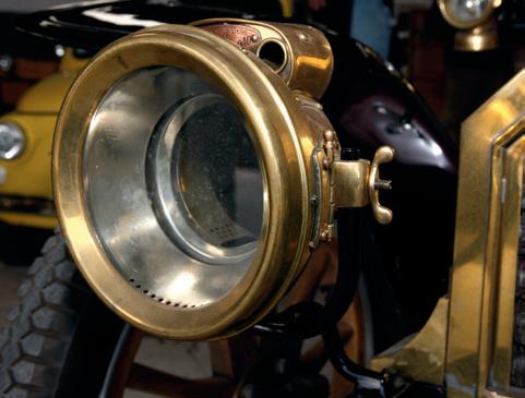 ..the brass Lucas acetylene lamps. The tank was mounted on one of the running boards.