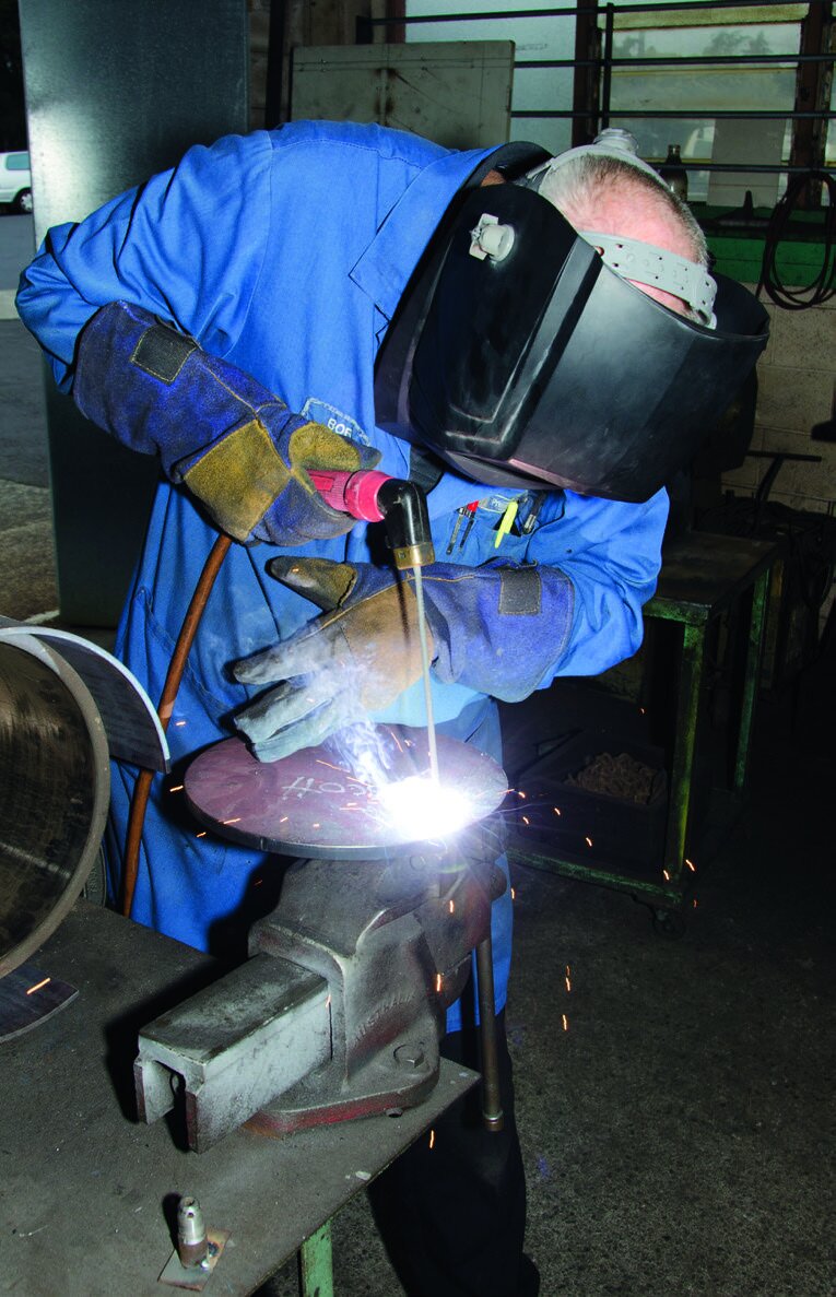 Welding the hinge pin in place