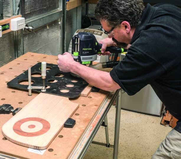 Using an inlay kit and handheld router to make the roundels