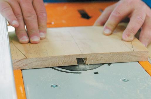 Cutting the sliding dovetail in the seatback before shaping it.