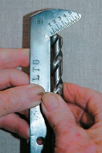 Twist drill cutting edge gauge.