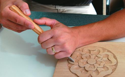 Ambidextrous: Right-handed (carver working from the right)...