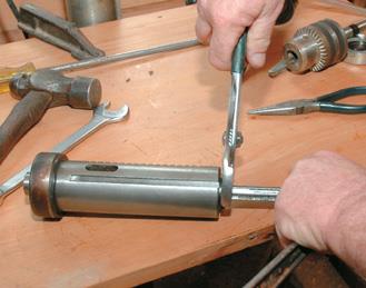 Tightening the bearing nut to pre-tension the bearings