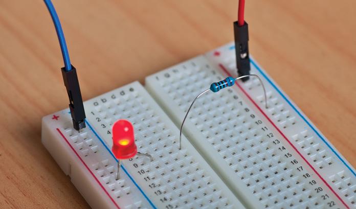 Using the breadboard to light a LED
