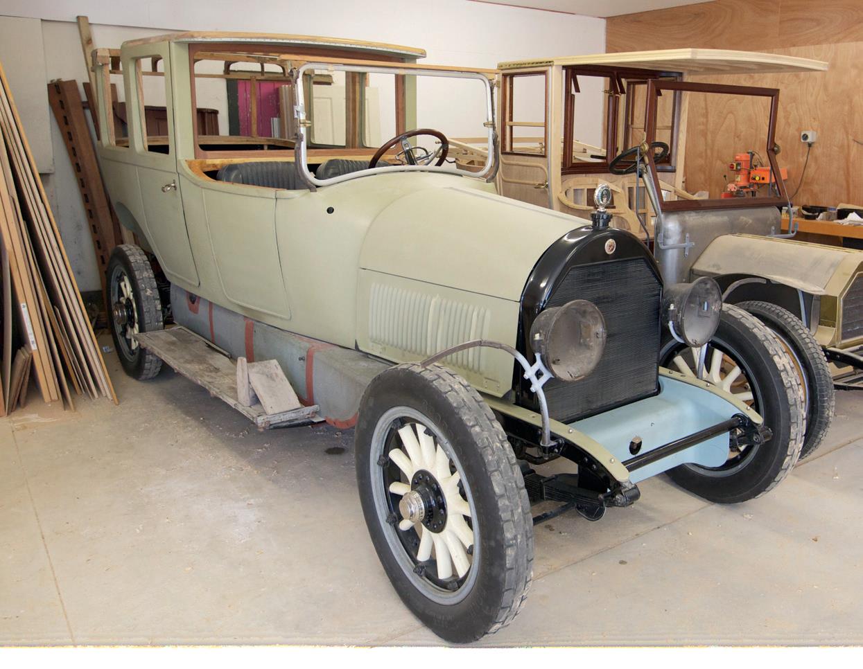 Sitting alongside the Arrol Johnston is another project, a 1918 Cadillac Landaulet.