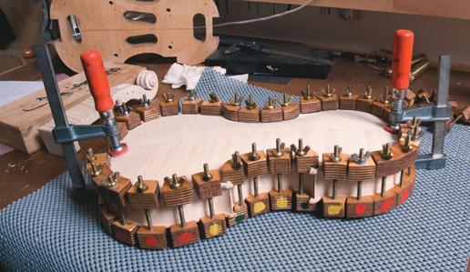 Front and back glued and clamped to body.