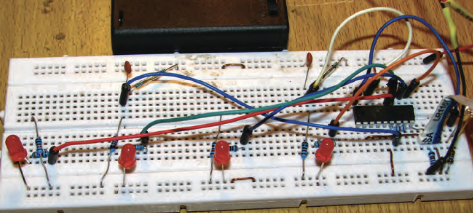 Timer breadboard testing using a 3-pin download cable.