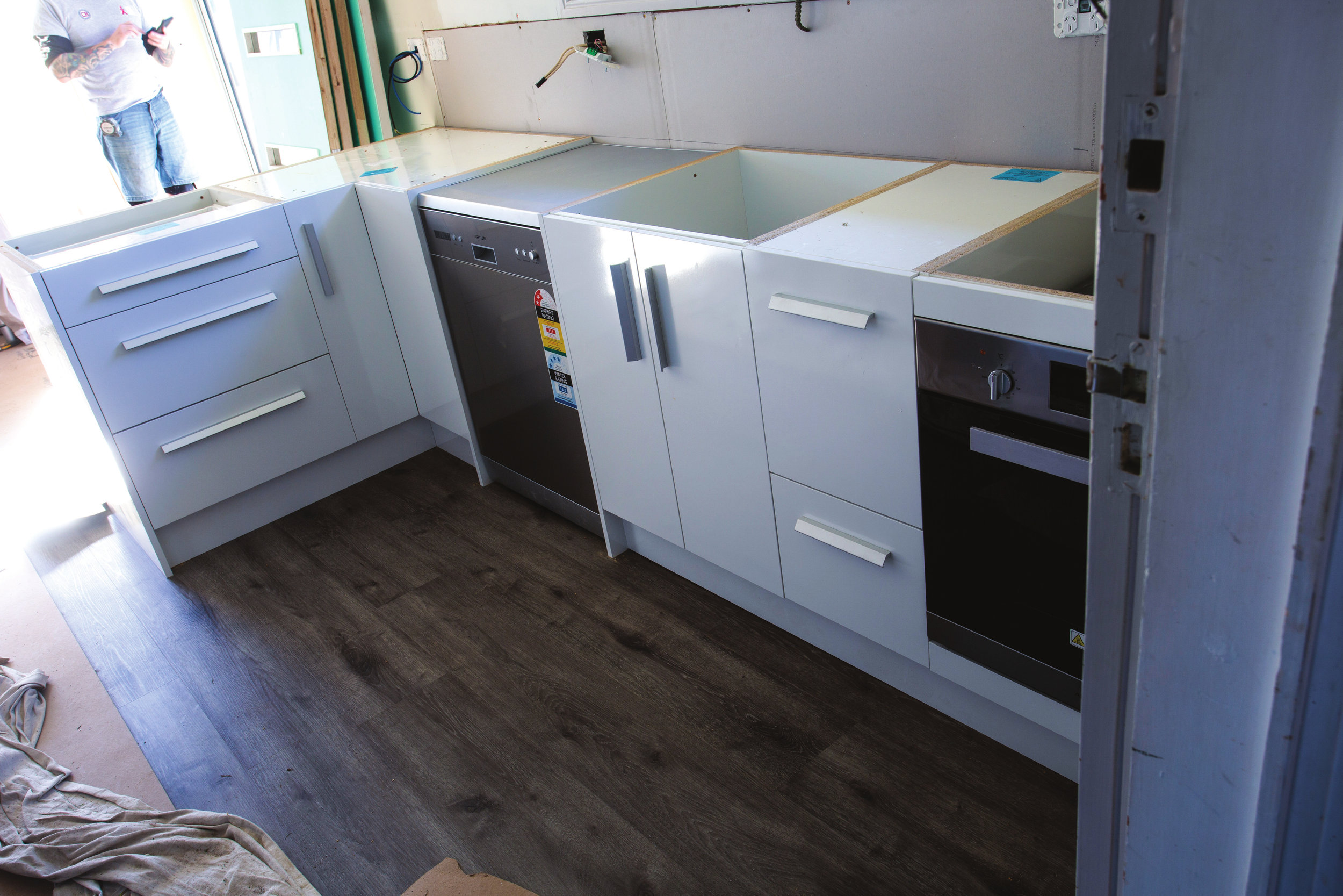 Our completed, installed flat-pack kitchen, just waiting for the bench top to finish off the job