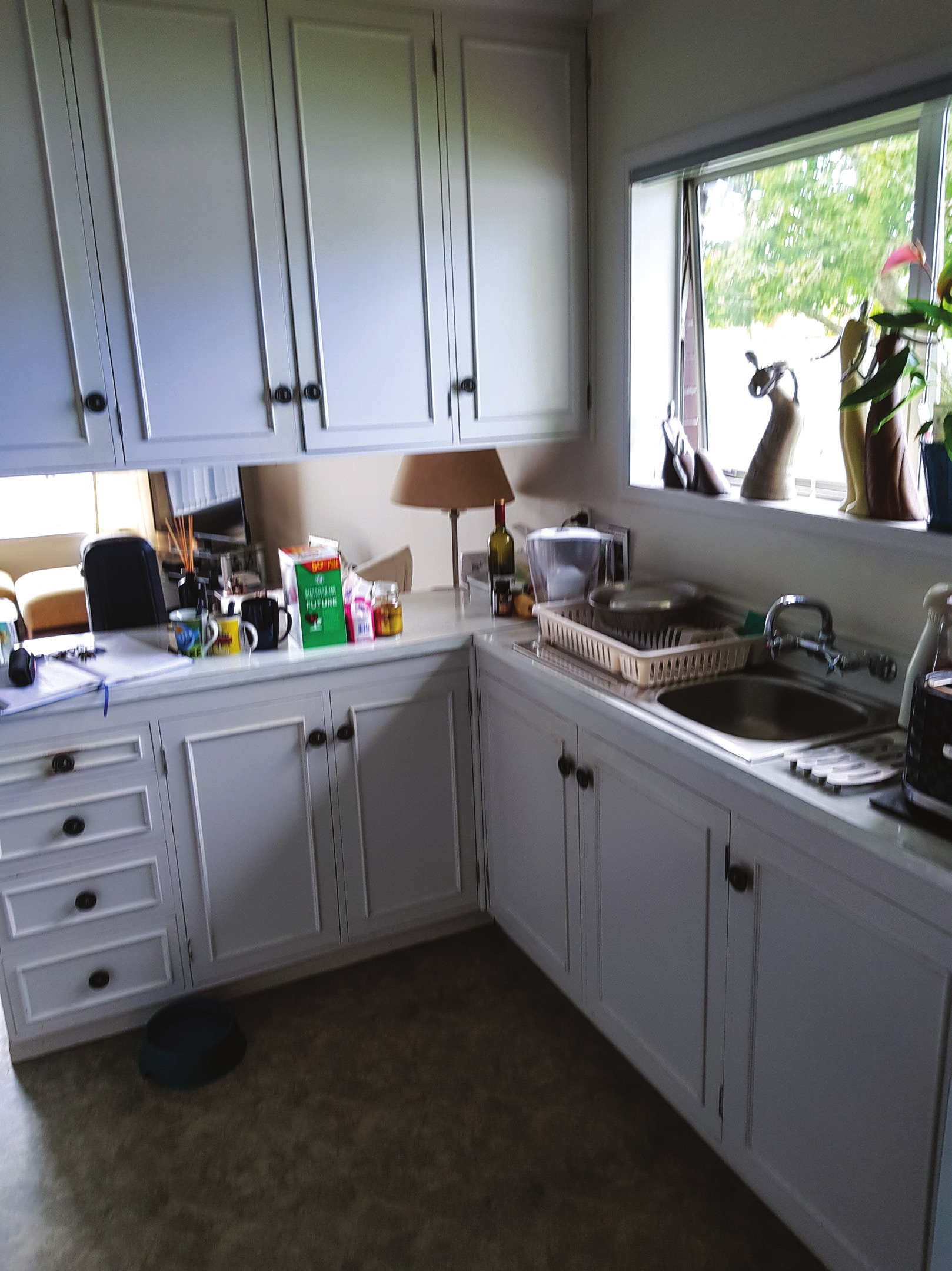  The old existing kitchen was dated and darkened by the ceiling-hung units 
